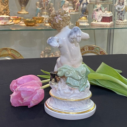 Meissen Porcelain Figure of Cupid Pressing Hearts Together