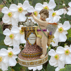 Meissen Porcelain Figure of Cupid Holding the...