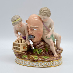 Meissen Porcelain Figure of Group, Two Putti Playing a Large Mask
