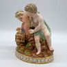 Meissen Porcelain Figure of Group, Two Putti Playing a Large Mask