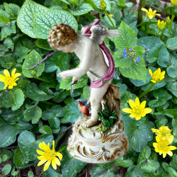 Meissen Porcelain Figure of Cupid Capturing A...