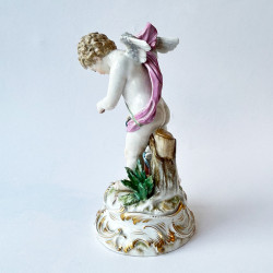 Meissen Porcelain Figure of Cupid Capturing A Heart with Blue Ribbon