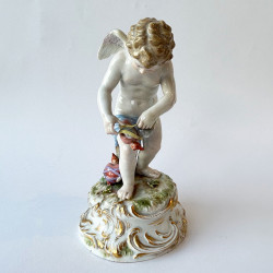 Meissen Porcelain Figure of Cupid Binding a Heart