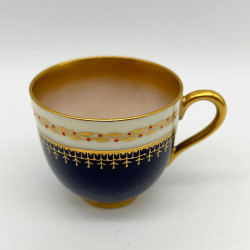 A Pair of Royal Worcester Demitasse  cobalt blue and Beige with Red Bijoux