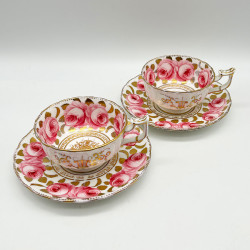 English Porcelain Pair of Cups and Saucers Decorated with Roses