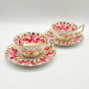English Porcelain Pair of Cups and Saucers Decorated with Roses