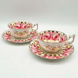 English Porcelain Pair of Cups and Saucers Decorated with Roses