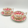 English Porcelain Pair of Cups and Saucers Decorated with Roses