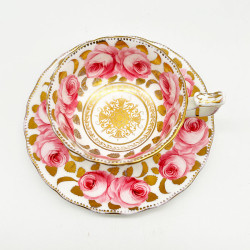 English Porcelain Pair of Cups and Saucers Decorated with Roses