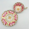 English Porcelain Pair of Cups and Saucers Decorated with Roses