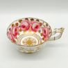 English Porcelain Pair of Cups and Saucers Decorated with Roses