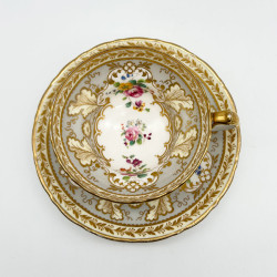 Cauldon China Trio, Decorated with hand Painted Flowers and Gold Leaves