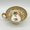 Cauldon China Trio, Decorated with hand Painted Flowers and Gold Leaves