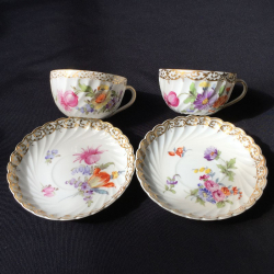 Nymphenburg Porcelain Set of Six Cups and Saucers Decorated with Bouquets